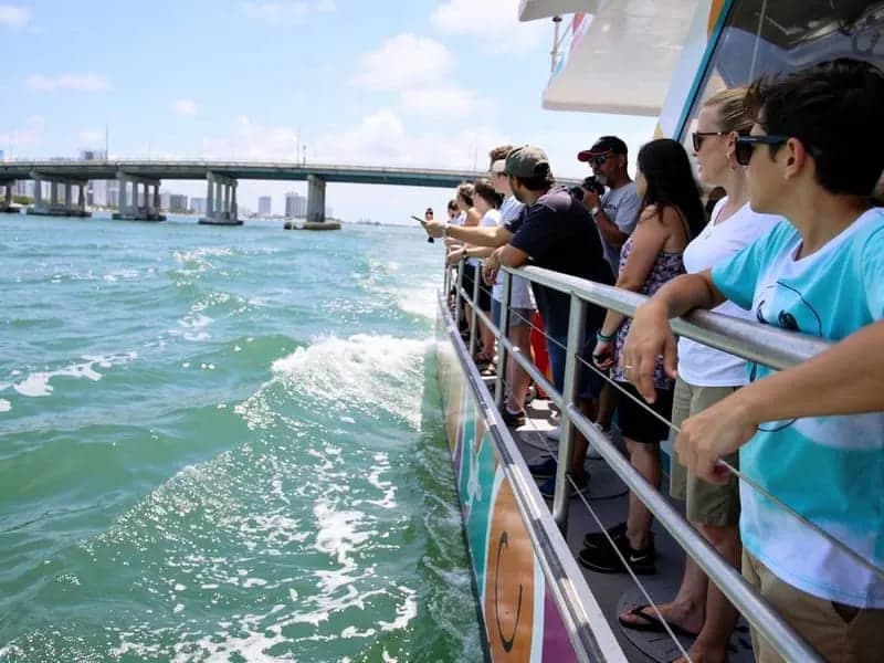 Guests gathered on the deck of the tour boat