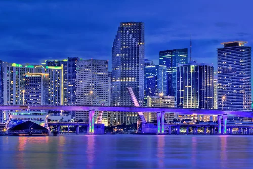 Twilight skyline view from the boat with bridge lights
